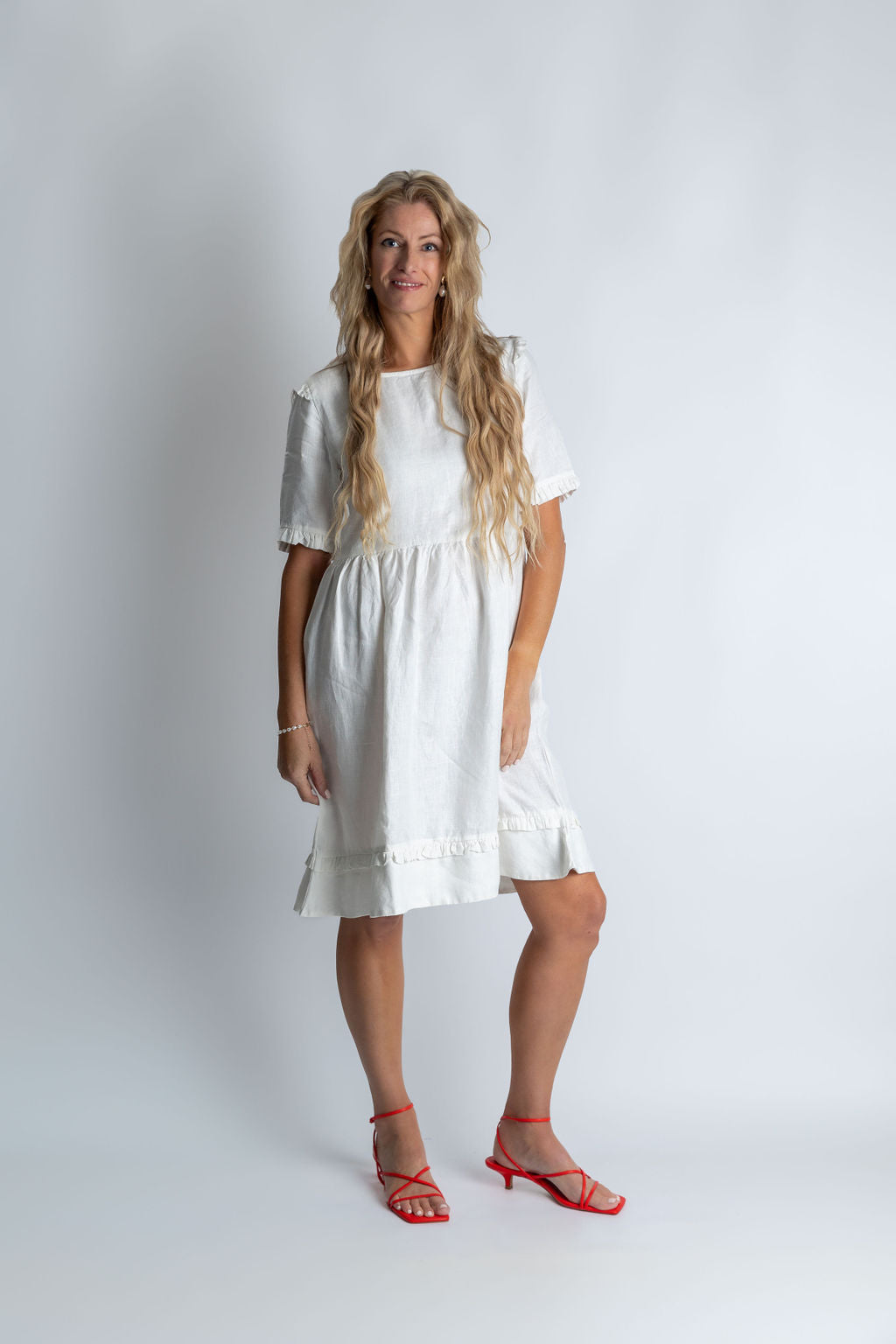 Tidal whirl flare ruffle dress in White